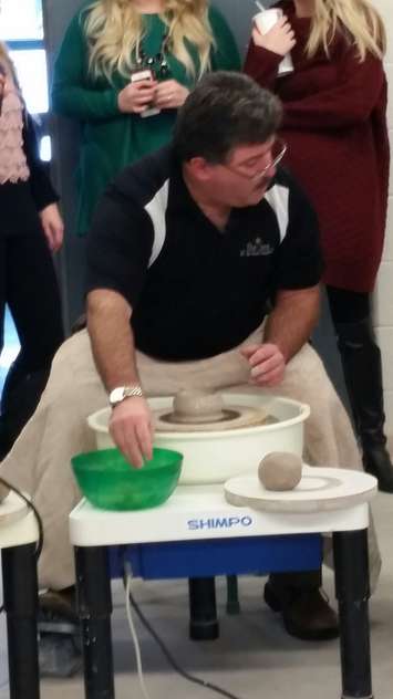 Inn of the Good Shepherd's Myles Vanni tries his hand at pottery at Lambton College. January 12, 2015 (BlackburnNews.com photo by Jake Jeffrey)