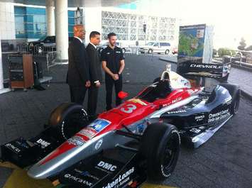 (from left to right) GM Charles Burns of the Chevrolet Detroit Belle Isle Grand Prix, Windsor Mayor Eddie Francis, and Izod IndyCar driver and Canadian James Hinchcliffe.