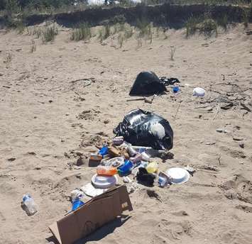 Garbage at the beach. Photo courtesy of Pinery Provincial Park via Twitter. 

