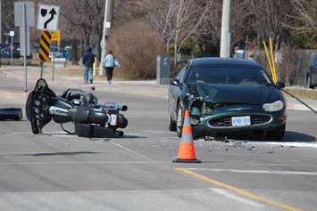 One person has been sent to hospital following a crash at the intersection of Lauzon Rd. and McHugh St., April 1, 2015. (Photo by Jason Viau)