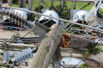 Crews assess and clean up the damage left near the EC Row Expressway and Central Avenue in Windsor on August 25, 2016 after a tornado hit the area. (Photo by Ricardo Veneza)
