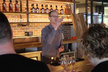Hiram Walker & Sons Master Blender Don Livermore educating a group about the Canadian whiskey made at Windsor's distillery, March 22, 2017. (Photo by Mike Vlasveld)