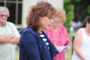 Rebecca Ismail, Director of Education, Coordination and Clinical Projects with the Leamington District Memorial Hospital, addresses those in attendance at the 15th annual Butterfly Release Memorial for infant loss in Leamington on June 22, 2016. (Photo by Ricardo Veneza)
