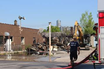 The investigation into Monday's fire on Wyandotte St. E between Parent Ave. and Marentette St. in Windsor continues.  (Photo by Adelle Loiselle)