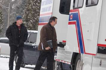 Windsor police detectives canvass the Benjamin Ave. area on January 21, 2015 where a pregnant woman was murdered on December 11, 2014. (Photo by Jason Viau)