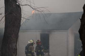 Windsor fire crews battle a blaze at 1574 Gladestone Ave., April 7, 2015. (Photo by Jason Viau)