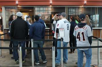 Detroit Tigers baseball fans buy tickets for the Transit Windsor Tunnel Bus on Opening Day 2015, April 6, 2015. (Photo by Mike Vlasveld)