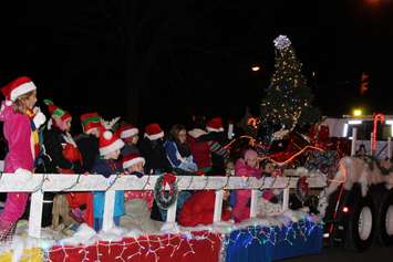 Local residents line the streets of Downtown Chatham during the Santa Clause Parade, November 20, 2015. (Photo by Ricardo Veneza)