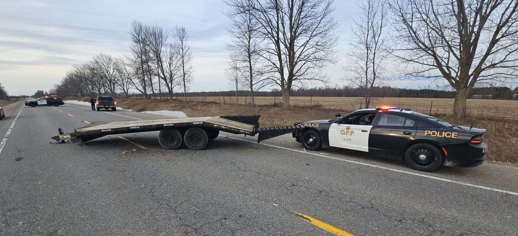 Two-vehicle crash sends trailer into OPP cruiser near Harriston