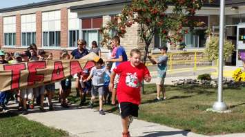 Bothwell student Joey DeNuke leads his schoolmates on their Terry Fox Run (Photo by Jake Kislinsky)