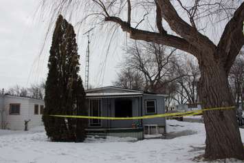 A fire at a mobile home on Marlin Crt. is under investigation.  February 17, 2015.  (Photo by Roy Kang)