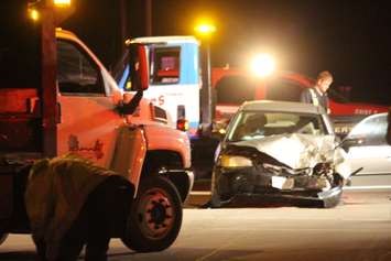 Emergency crews respond to a crash at the intersection of Walker Rd. and HWY 3, April 21, 2015. (Photo by Jason Viau)