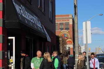 St. Patrick's Day patrons line up outside the Walkerville Tavern in Windsor Tuesday March 17, 2015.  (Photo by Adelle Loiselle) 