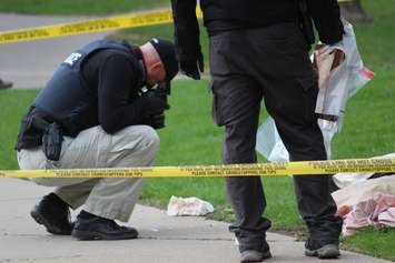 Windsor police investigate a stabbing in the 400 block of Glengarry Ave., April 22, 2015. (Photo by Jason Viau)