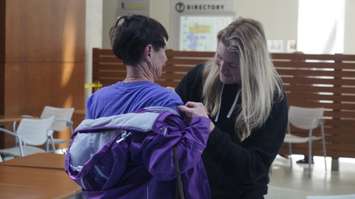 Dr. Hayley Wickenheiser signs T-shirt. May 18, 2023. (Photo by Natalia Vega)