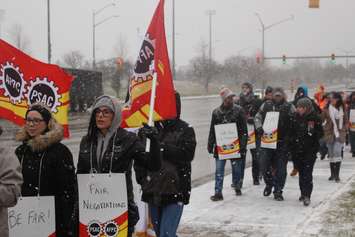 Members of the Customs and Immigration Union (CIU) rally along Huron Church Rd in Windsor on January 12, 2018. Photo by Mark Brown/Blackburn News