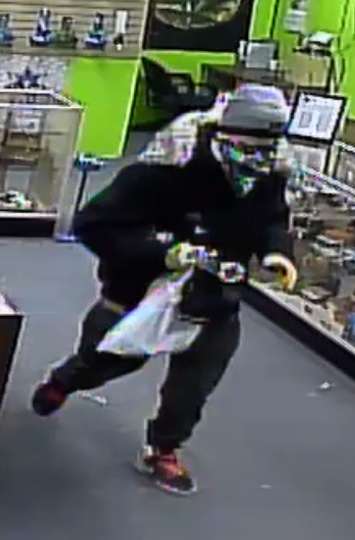 One of the suspects in a break in at the 420 Shop in London. Photo provided by London police.