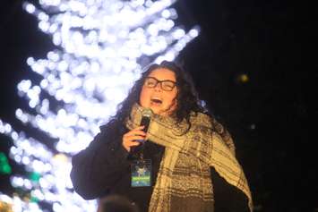 A singer performs before the tree lighting at Bright Lights Windsor, Jackson Park, December 6, 2019. Photo by Mark Brown/Blackburn News.