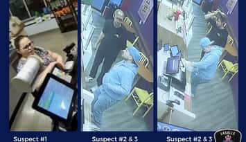 Security camera images of three people suspected of passing counterfeit money. Images provided by LaSalle police.