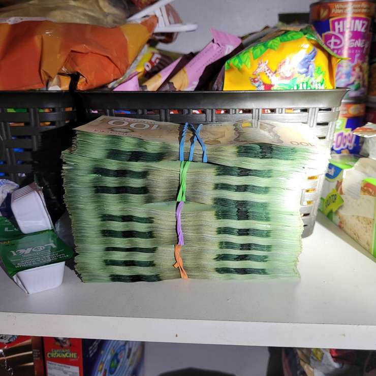 Cash seized by police (Image courtesy of the Ontario Provincial Police)