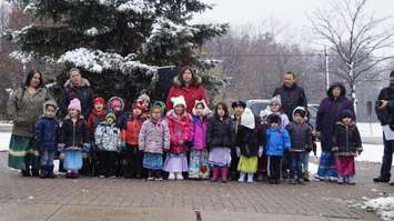 Indigenous kindergarten students singing O’Canada in Ojibwe during the Remembrance Day ceremony at Aamjiwnaang First Nation. November 11, 2018. (Photo by Colin Gowdy, BlackburnNews)