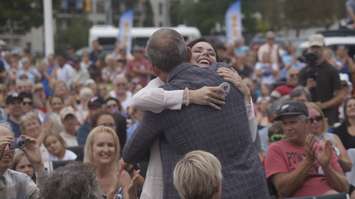 Chris Hadfield hugs fellow Canada Walk of Fame inductee Tessa Virtue at Canada’s Walk of Fame Hometown Star Celebration. August 6, 2019. (BlackburnNews photo by Colin Gowdy)