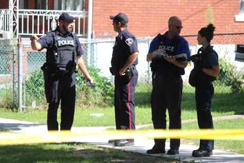 Windsor police on scene of a pedestrian being hit in west Windsor on July 30, 2015. (Photo by Jason Viau)