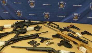 Multiple guns and weapons seized from a north London home, November 28, 2023. Photo provided by London police.