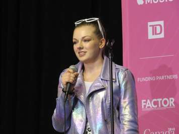 Girls Rock Camp participant Meriel Reed speaks to media at the 2019 Juno Awards at Budweiser Gardens, March 17, 2019. (Photo by Miranda Chant, Blackburn News)