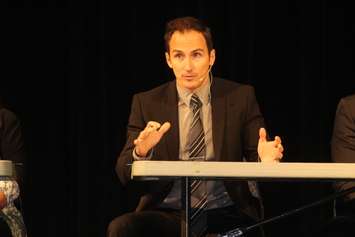 Chris Carpenter, a candidate in Tecumseh's Ward 2 by-election, takes questions from residents at a 'meet the candidates' event held at L'Essor Secondary School on October 3, 2016. (Photo by Ricardo Veneza)