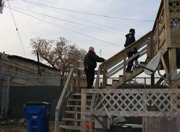 Whitney Burk and Chris Case going door-to-door as part of their reassurance campaign. November 22, 2016. (Photo by Natalia Vega)