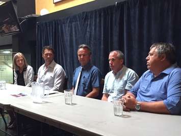 Members of Sarnia City Council, the Sarnia Sting, Progressive Auto Sales and the City of Sarnia gather at Legends Restaurant to reveal the design for the new Progressive Auto Sales Arena logo. August 15, 2016 BlackburnNews.com photo by Melanie Irwin