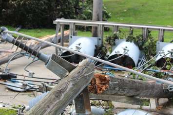 Crews assess and clean up the damage left near the EC Row Expressway and Central Avenue in Windsor on August 25, 2016 after a tornado hit the area. (Photo by Ricardo Veneza)