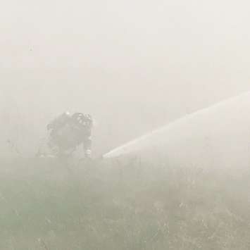 A grass fire near Michigan Ave. and Blackwell Rd. - May 9/18 (Photo Courtesy of Sarnia Fire and Rescue Via Twitter)