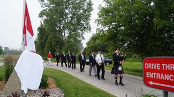 Global Donuts on London Line officially raised the Canadian flag and unveiled a memorial plaque Tuesday. June 30, 2015 (BlackburnNews.com Photo by Briana Carnegie)