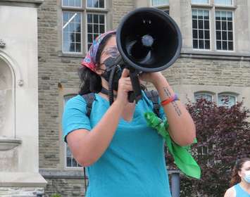 One of the organizers of the Western walkout in support of survivors of sexual violence leads the crowd in a chant, September 17, 2021. (Photo by Miranda Chant, Blackburn News)