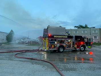 Firefighters battle a blaze at the Woodstock Fairgrounds, September 1, 2020. (Photo courtesy of the Woodstock Fire Department via Twitter)
