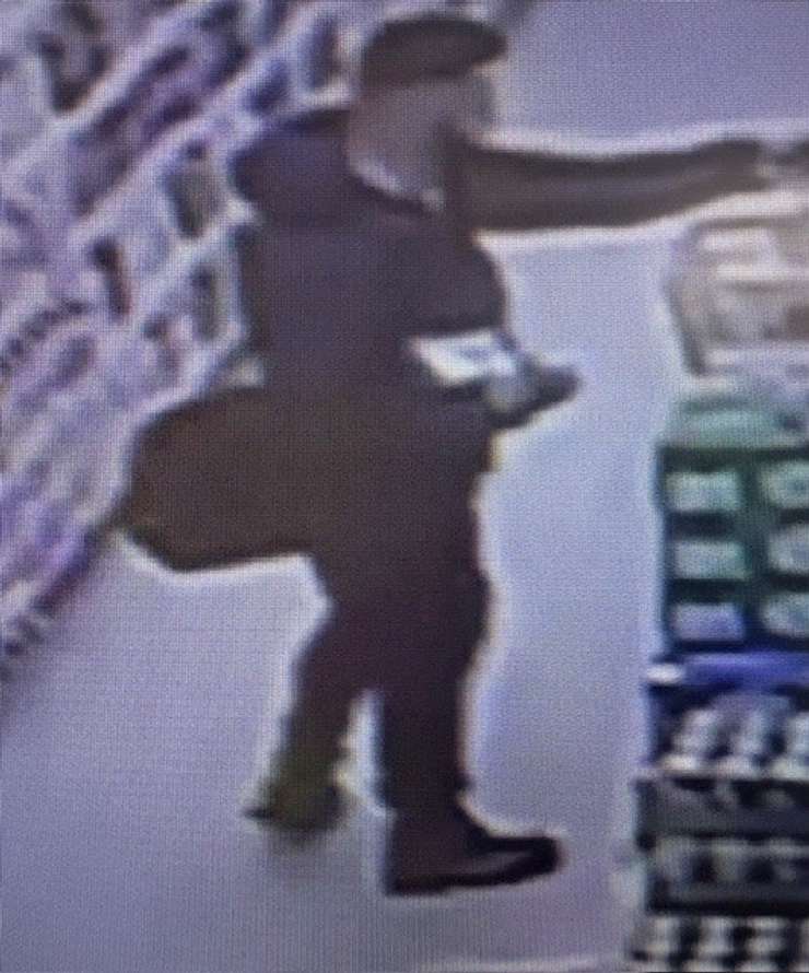 Suspect sought in theft from Corunna business - March 2/25 (Photo courtesy of Lambton OPP)