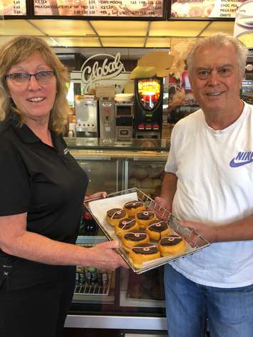 Sarnia & District Humane Society Manager Donna Pyette with Global Donuts & Deli Owner Gus Pantazis.  (Photo from the Humane Society's Facebook)