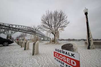 Strong winds and bitterly cold air coat the St. Clair River waterfront with ice Jan. 15, 2018 (BlackburnNews.com photo by Dave Dentinger)