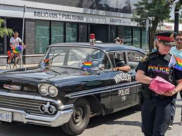 Windsor police participate in the Windsor Essex PrideFest Parade on Ottawa Street in Windsor, August 7, 2022. Photo by Mark Brown/WindsorNewsToday.ca.