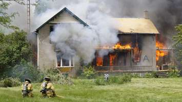 The Sarnia Fire Rescue Service conducts live fire training at 2172 London Line. June 9, 2017 (Photo by Melanie Irwin)