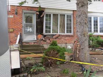 Damage to a home on Culver Dr. from a crash involving a single-vehicle, April 19, 2017. (Photo by Miranda Chant, Blackburn News.)