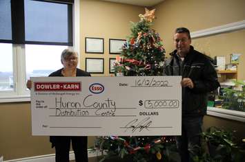 Pictured left to right; Mary Ellen, Huron County Food Bank Volunteer and Devin Little, Branch Manager (Photo courtesy of Dowler-Karn)