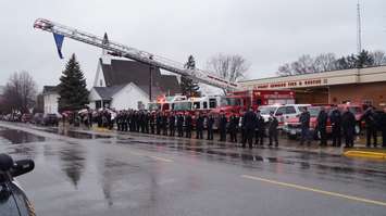 Crowds lined Michigan Ave. Monday to remember former Pt. Edward Mayor Dick Kirkland. December 21, 2015 (BlackburnNews.com Photo by Briana Carnegie)