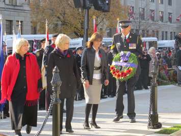 London MPP's Deb Matthews, Peggy Sattler, and Teresa Armstrong prepare to lay a wreath at the Cenotaph. Photo by Miranda Chant, BlackburnNews.com