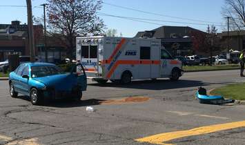 A vehicle flipped on its side in a crash on Lambton Mall Rd. May 19, 2016 (BlackburnNews.com photo by Briana Carnegie)