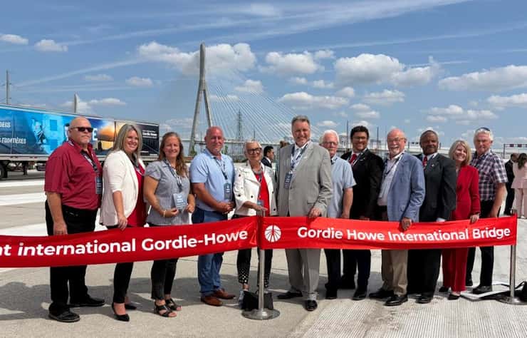 (Photo of dignitaries at the Gordie Howe International Bridge ribbon-cutting ceremony by Maureen Revait)