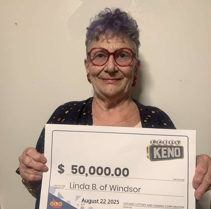 Linda Brugma of Windsor with her $50,000 prize cheque for playing Daily Keno, at the OLG Prize Centre in Toronto, August 22, 2025. Photo provided by OLG