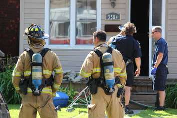 Fire crews respond to a fire at 3584 King St., June 3, 2015. (Photo by Jason Viau)